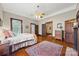 Inviting main bedroom boasts hardwood floors and natural light from a window at 4569 Edgeland Rd, Edgemoor, SC 29712