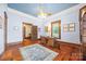 Home office features hardwood floors, custom woodwork, and ample natural light at 4569 Edgeland Rd, Edgemoor, SC 29712