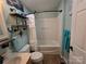 Charming bathroom with decorative shelves and a bathtub-shower combination for added convenience at 490 Deberry Rd, Mount Gilead, NC 27306
