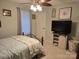 The bedroom includes a TV and storage, offering both entertainment and practicality at 490 Deberry Rd, Mount Gilead, NC 27306