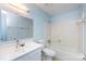 Cozy bathroom featuring a large mirror and a tub-shower combination at 509 Selkirk Pl, Charlotte, NC 28270