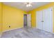 Bedroom featuring a ceiling fan and a closet, providing ample storage space at 509 Selkirk Pl, Charlotte, NC 28270