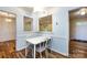 Charming breakfast nook with a modern table and chairs, and lots of natural light at 509 Selkirk Pl, Charlotte, NC 28270