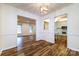 Hardwood dining room with view to living room and kitchen at 509 Selkirk Pl, Charlotte, NC 28270