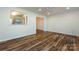 Bright living room featuring hardwood floors and recessed lighting at 509 Selkirk Pl, Charlotte, NC 28270