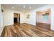 Open living room featuring hardwood floors and plenty of natural light at 509 Selkirk Pl, Charlotte, NC 28270