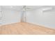 A spacious bedroom has neutral walls, wood-look floors, a ceiling fan and ample closet space at 518 Westside Cir, China Grove, NC 28023