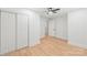 A serene bedroom boasts laminate flooring, neutral walls and generous closet space at 518 Westside Cir, China Grove, NC 28023