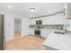 Beautiful kitchen with stainless steel appliances, white cabinets, and lots of counter space at 518 Westside Cir, China Grove, NC 28023