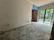 Open floorplan with exposed wood and natural light, features blue accent wall under construction at 5427 Addison Dr, Charlotte, NC 28211