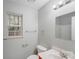 Well-lit bathroom featuring a single vanity, modern fixtures, and a window for natural light at 6216 Bandy Dr, Charlotte, NC 28227