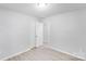 Neutral bedroom showcasing modern flooring, and multiple doors offering ample space at 6216 Bandy Dr, Charlotte, NC 28227