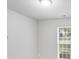Bright bedroom with a window for natural light and neutral paint at 6216 Bandy Dr, Charlotte, NC 28227