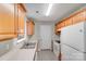 Functional kitchen with wooden cabinets and modern appliances at 6216 Bandy Dr, Charlotte, NC 28227