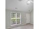Bright living room filled with natural light, modern flooring, and fresh neutral paint at 6216 Bandy Dr, Charlotte, NC 28227
