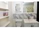 Well-lit bathroom featuring a toilet, sink and vanity, and shelving at 709 Sunset Dr, Salisbury, NC 28147