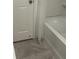 This bathroom has a clean, white tub with a shower curtain at 709 Sunset Dr, Salisbury, NC 28147