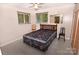 Neutral-colored bedroom featuring natural light and simple decor elements at 709 Sunset Dr, Salisbury, NC 28147