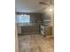 The kitchen has gray cabinets, modern appliances, and a bright window at 709 Sunset Dr, Salisbury, NC 28147