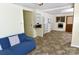 Open living room area featuring light walls and flooring plus built-in shelving at 709 Sunset Dr, Salisbury, NC 28147