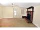 Bright living area with brick fireplace, neutral walls, and open floor plan creates a warm ambiance at 709 Sunset Dr, Salisbury, NC 28147