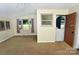 Open living space featuring an array of windows and a clear view to the front yard at 709 Sunset Dr, Salisbury, NC 28147