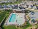 Aerial view of the community pool, playground and clubhouse at 813 Latrobe Dr # 365, Iron Station, NC 28080