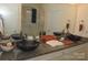 Bathroom with double vessel sinks, granite countertops, large mirror, and tiled shower at 813 Latrobe Dr # 365, Iron Station, NC 28080