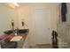 Bright bathroom featuring granite vanity, vessel sink, tiled shower, and modern fixtures at 813 Latrobe Dr # 365, Iron Station, NC 28080