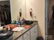 Spacious bathroom with double sinks, granite countertops, and decorative towels at 813 Latrobe Dr # 365, Iron Station, NC 28080