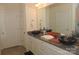 Large bathroom with double vessel sink, granite countertop, and tile flooring at 813 Latrobe Dr # 365, Iron Station, NC 28080