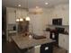 Spacious kitchen featuring an island with granite countertops and stainless steel appliances at 813 Latrobe Dr # 365, Iron Station, NC 28080