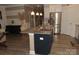 Kitchen featuring an island with granite countertops and stainless steel appliances at 813 Latrobe Dr # 365, Iron Station, NC 28080