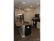 Spacious kitchen featuring an island with granite countertops and stainless steel appliances at 813 Latrobe Dr # 365, Iron Station, NC 28080