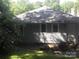 Rear exterior of home showing vinyl siding, windows and backyard at 816 Parkwood Ave, Charlotte, NC 28205