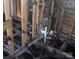 Interior view showcasing exposed pipes, studs, and underfloor structures at 816 Parkwood Ave, Charlotte, NC 28205