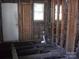 Interior view of a room with exposed wall studs and an open floor at 816 Parkwood Ave, Charlotte, NC 28205