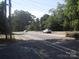 A view of the street with cars driving by and trees surrounding it at 816 Parkwood Ave, Charlotte, NC 28205