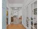 Inviting foyer with hardwood floors, complemented by an entry to another room behind double doors at 8410 Darcy Hopkins Dr, Charlotte, NC 28277