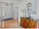 Entryway featuring wood flooring, decorative accents, and a view to the front door at 8410 Darcy Hopkins Dr, Charlotte, NC 28277