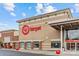 Exterior view of Target, showcasing the store's entrance, logo and seasonal red ball decor at 8410 Darcy Hopkins Dr, Charlotte, NC 28277
