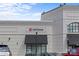 Lululemon store front displaying its logo and entrance as part of the Blakeney Shopping Center at 8410 Darcy Hopkins Dr, Charlotte, NC 28277