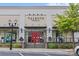 Talbots exterior view, displaying the front of the clothing store and its seasonal window displays at 8410 Darcy Hopkins Dr, Charlotte, NC 28277