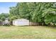 Backyard with storage shed, boat and privacy fence at 9000 Petunia Ct, Gastonia, NC 28056