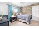 Bedroom with natural light, warm tones, and soft carpet. Includes a pet crate at 9000 Petunia Ct, Gastonia, NC 28056