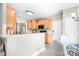 Bright kitchen features wood cabinets, granite countertops, and an eat-in area for casual dining at 9000 Petunia Ct, Gastonia, NC 28056