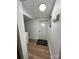 Hallway features wood-look flooring, neutral paint, and a textured doormat at 918 8Th St # 5, Lancaster, SC 29720