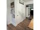 Hallway featuring wood-look floors and white doors at 918 8Th St # 5, Lancaster, SC 29720