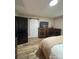 Comfortable main bedroom with a modern sliding barn door and wood-look floors at 918 8Th St # 5, Lancaster, SC 29720