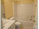 Well-lit bathroom with a single sink vanity and a shower-tub combination at 9237 Bellegarde Dr, Charlotte, NC 28277